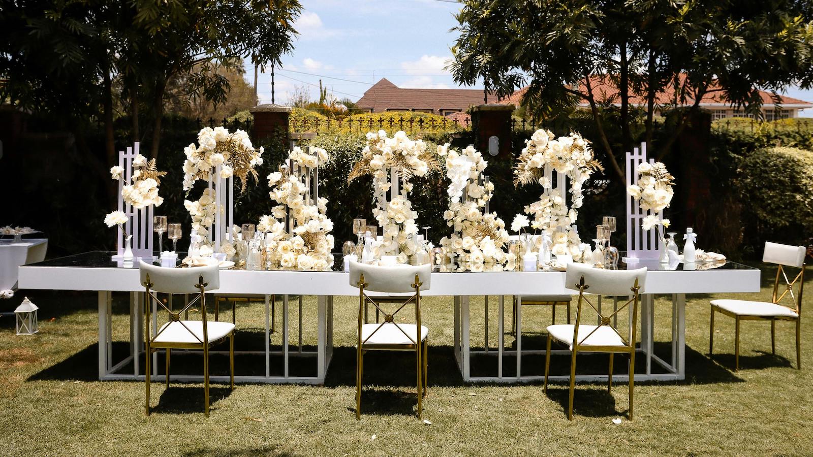 Elegant Flower Arrangement on a Table Standing in a Garden