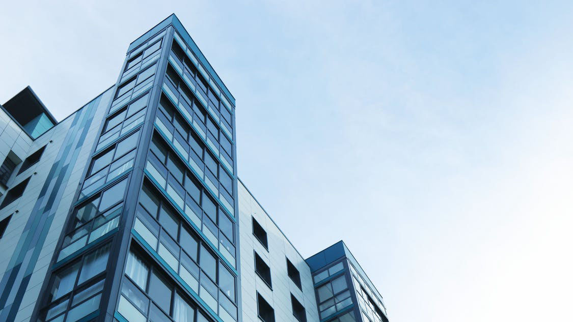 Low angle view of an office building against a clear sky