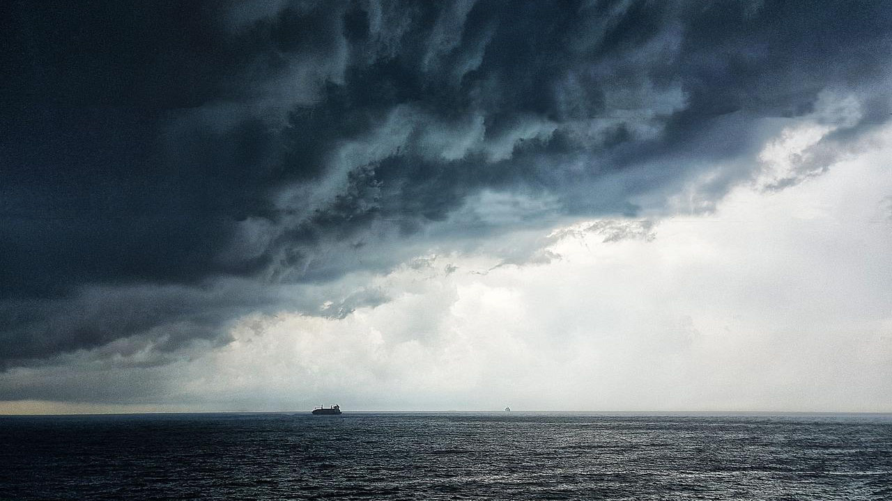 dark clouds of a storm over an ocean