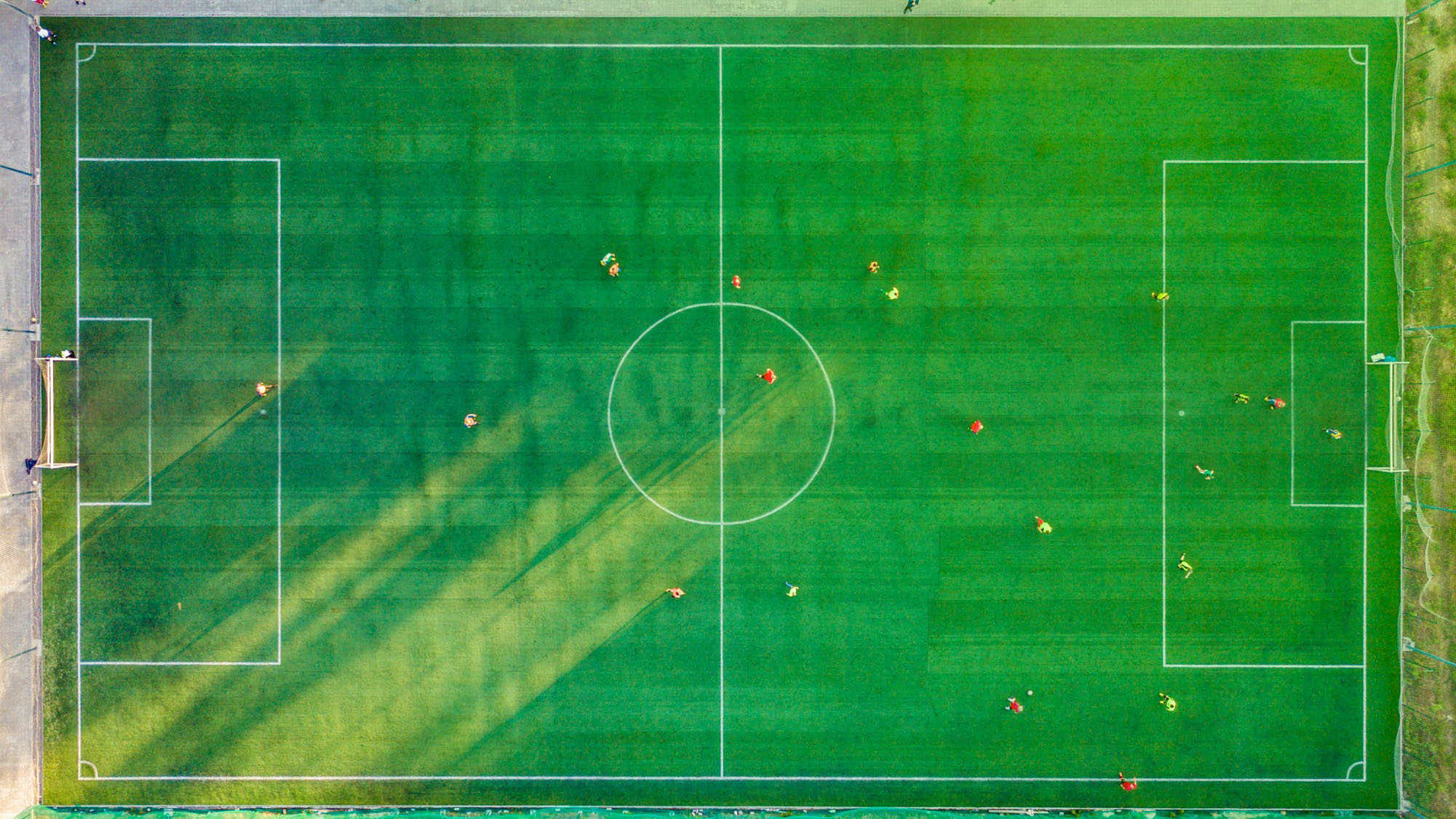 aerial view of a soccer field with players