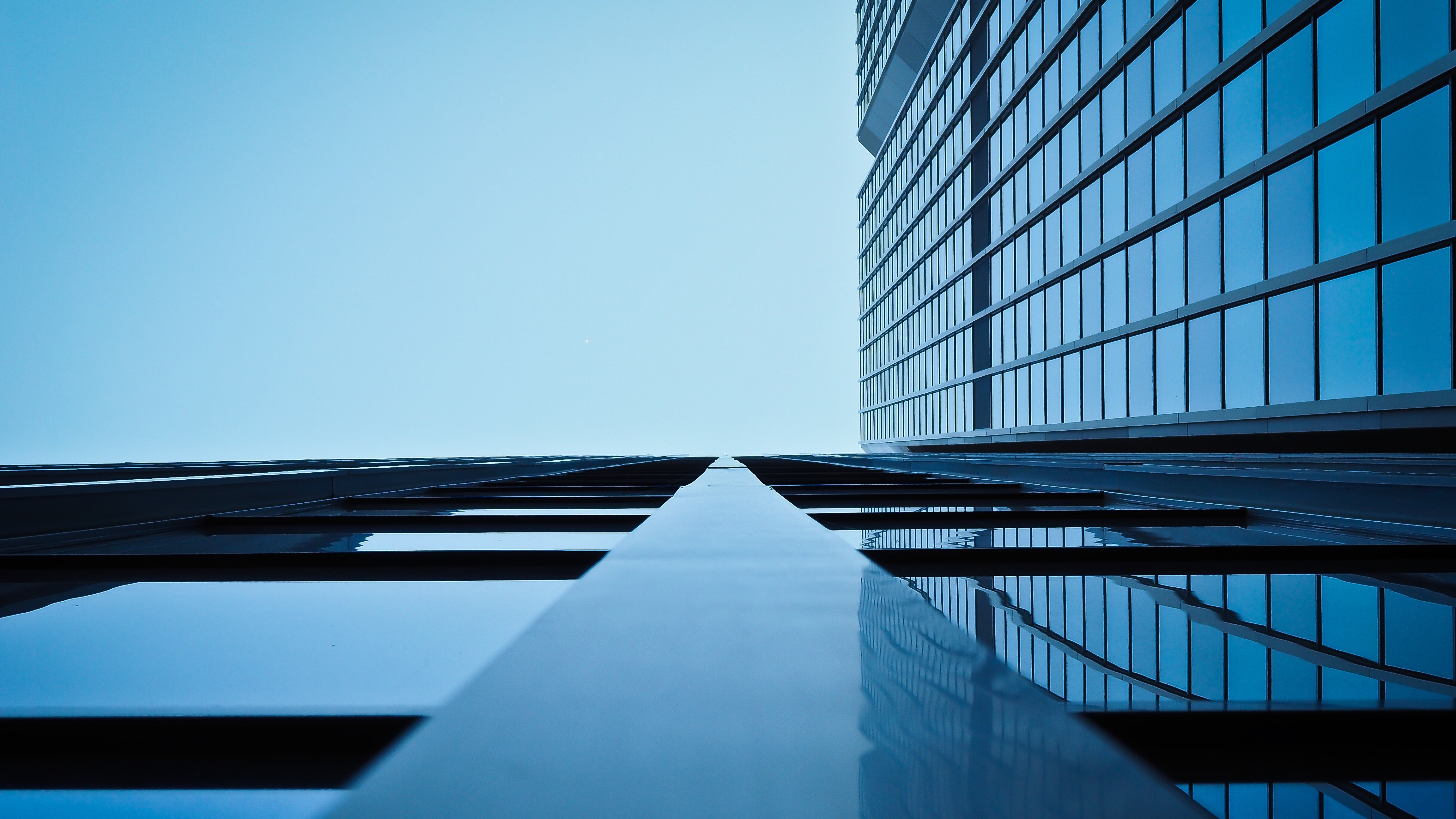 Low angle photo of a building tinted blue