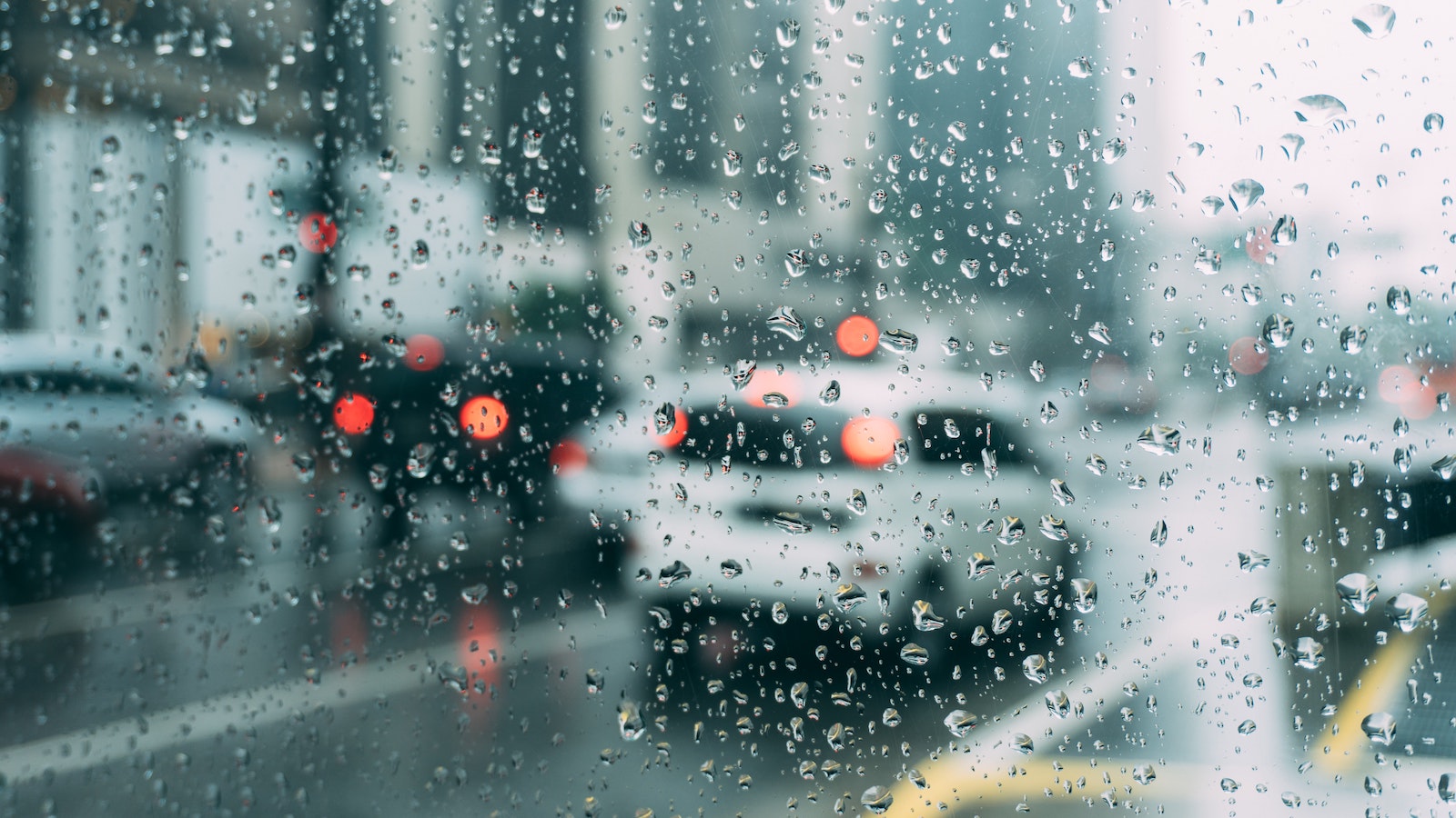 Cars on the street during a rainstorm