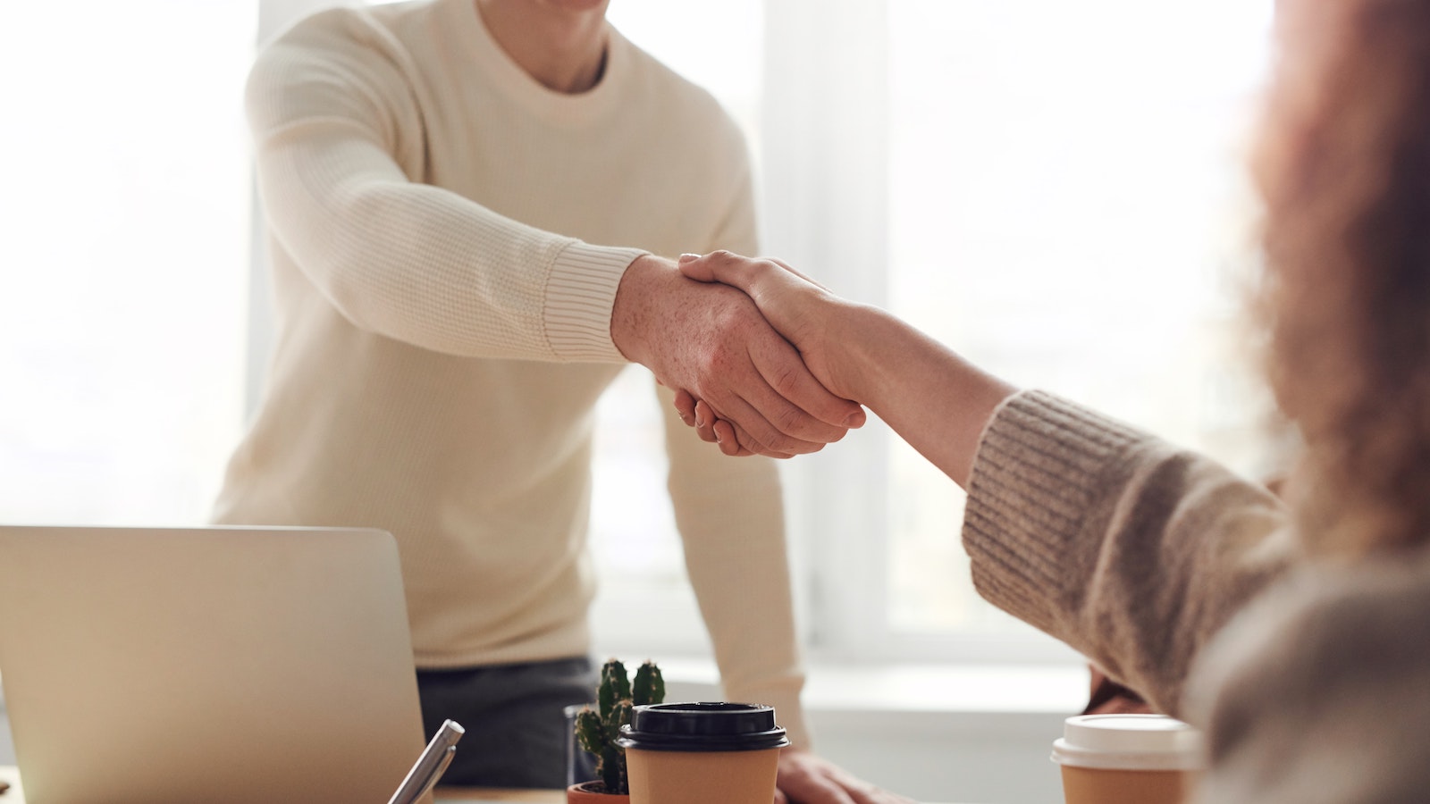 Two people shaking hands