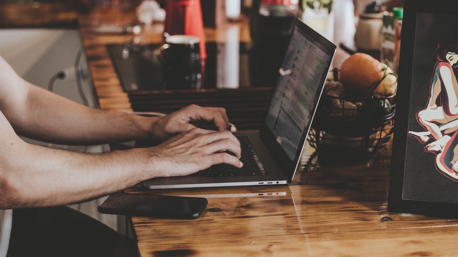 Person typing on a computer