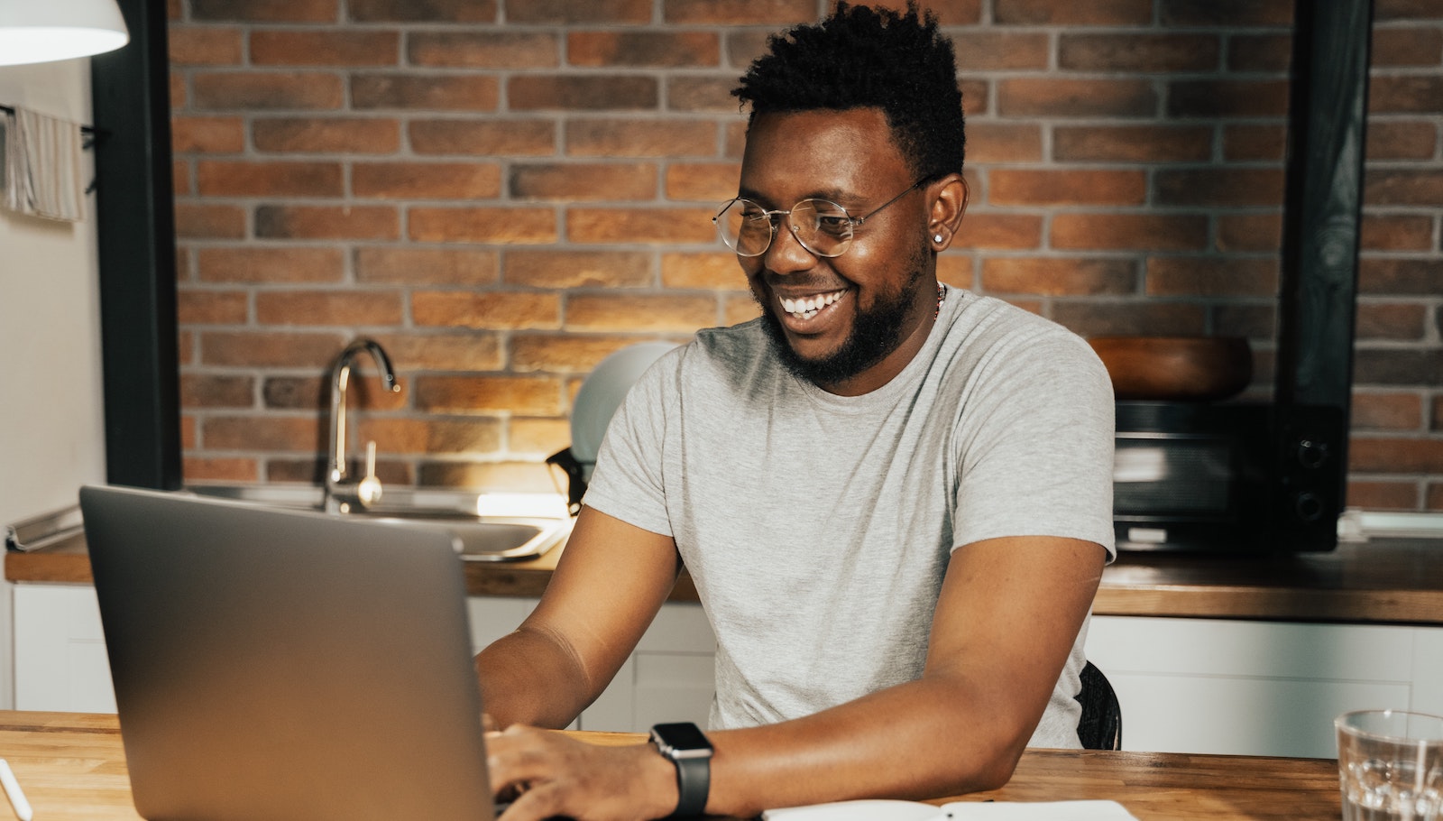 Person on laptop in their home