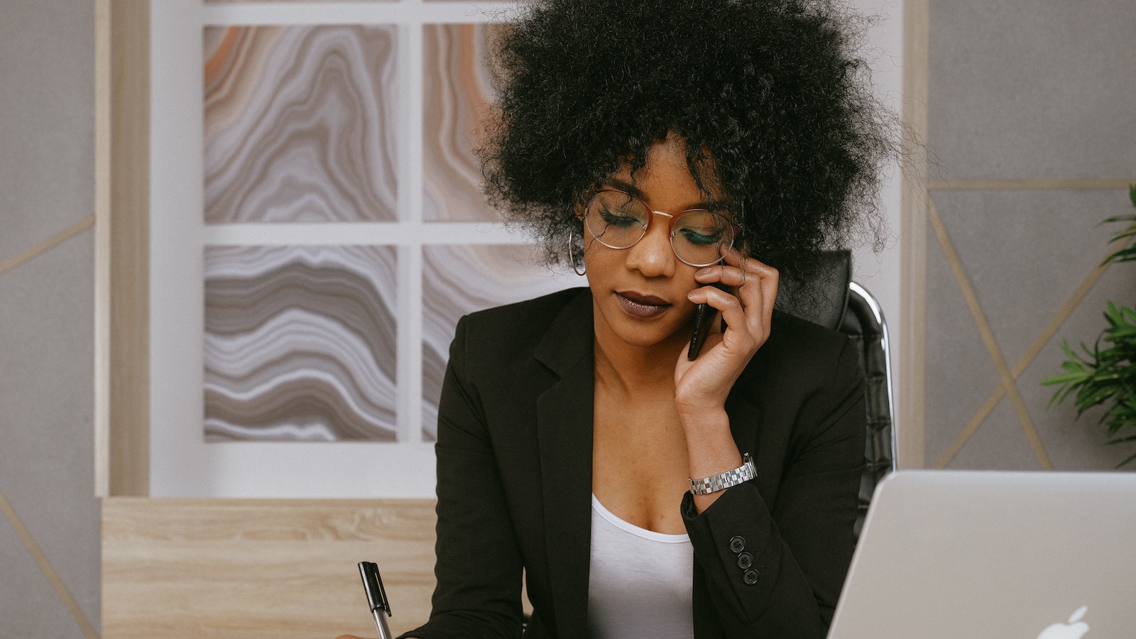 Person on the phone at a desk