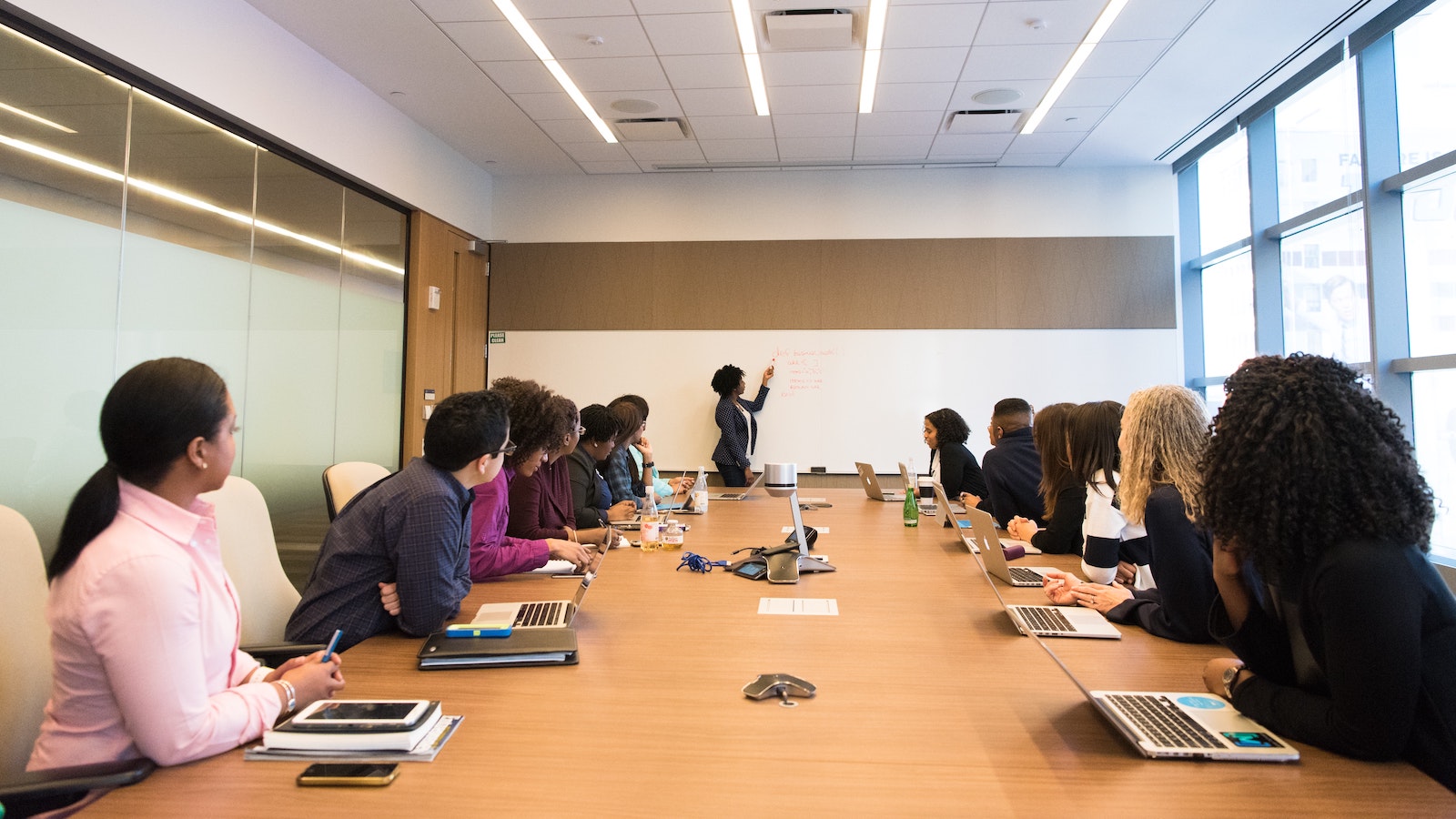 Person giving a presentation in a conference room