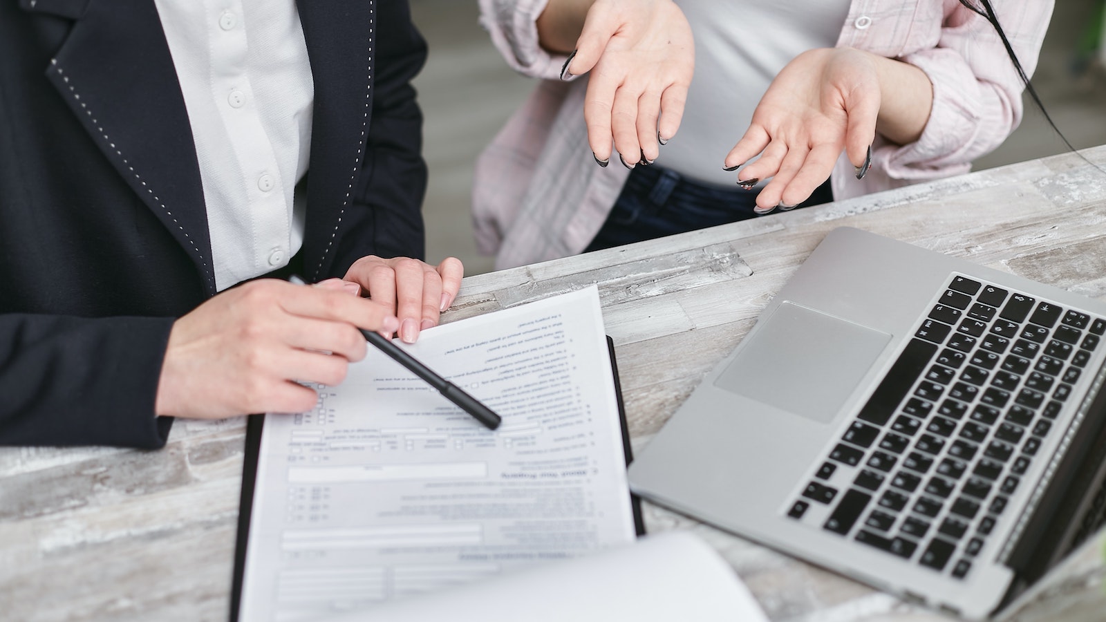 People looking over a document