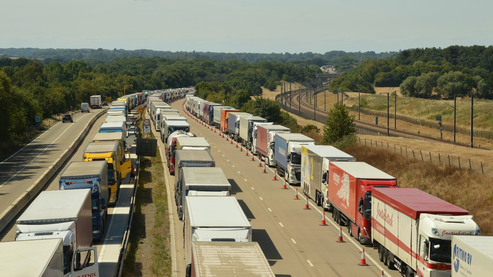 Trucks lined up on a highway