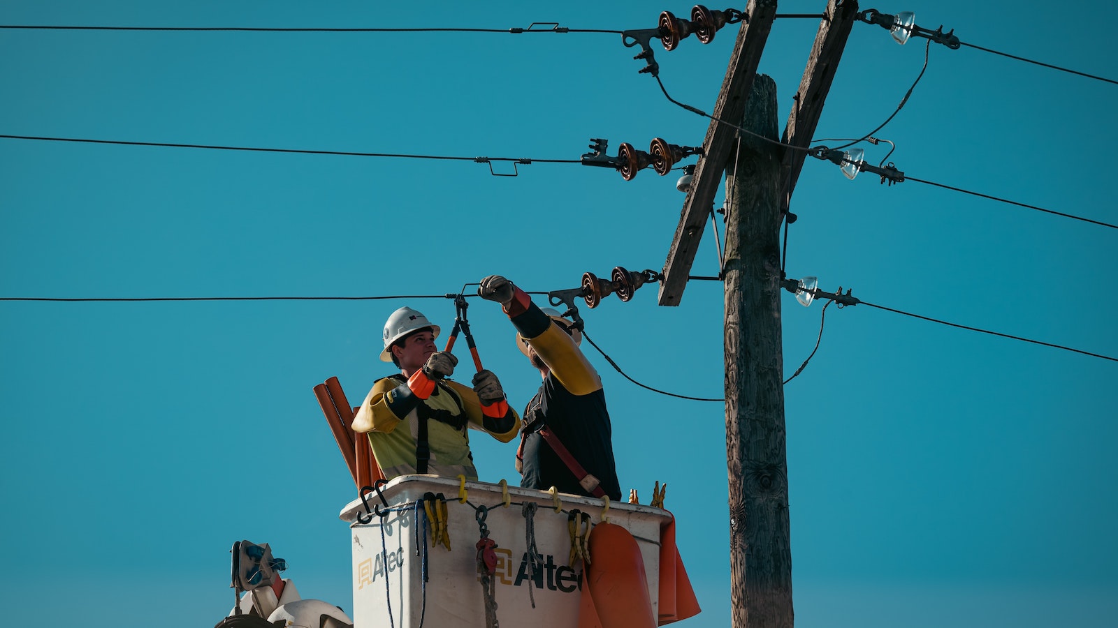 Workers working on power lines