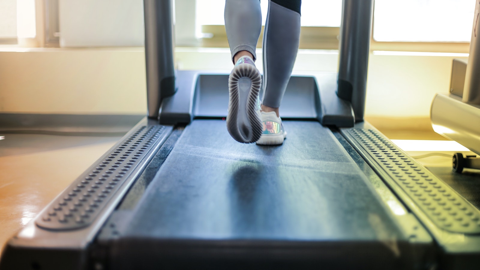 Person running on a treadmill