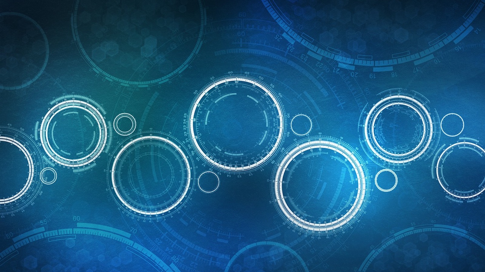 Abstract circles representing the digital world and the metaverse across a blue background