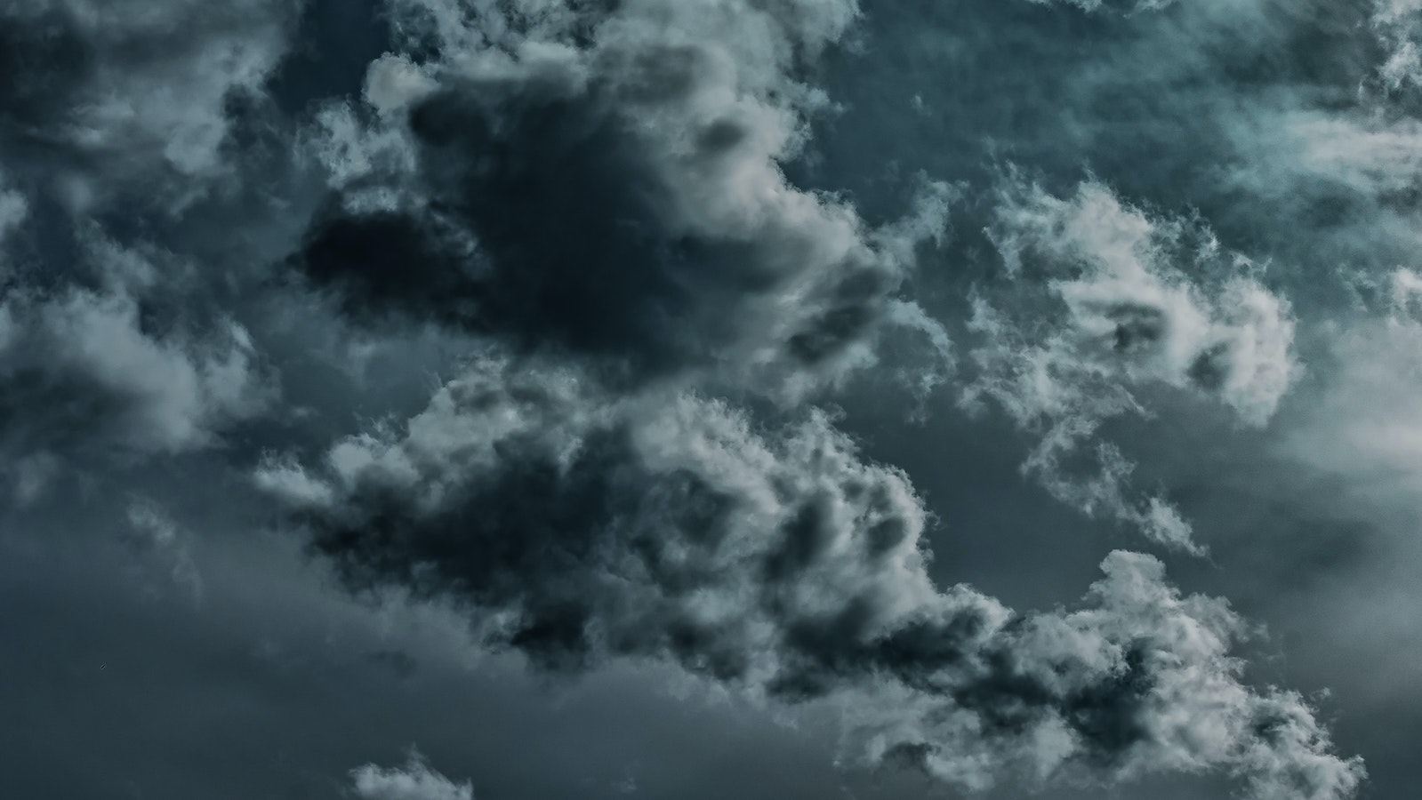 Dark storm clouds in a dark sky