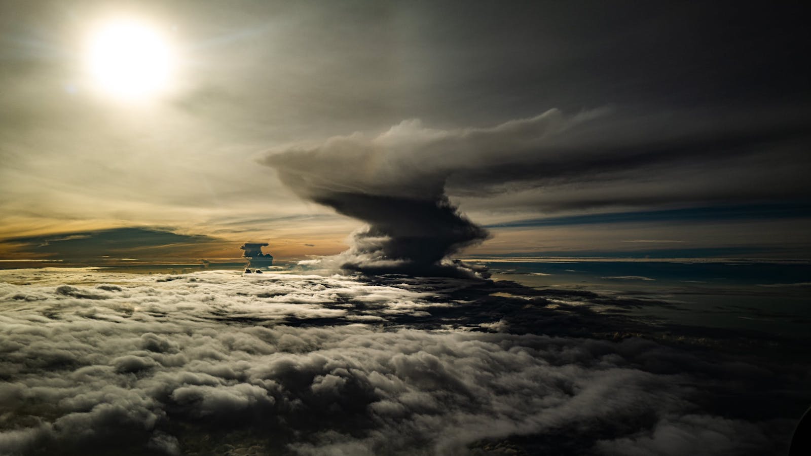 sky view of a tornado under a sunny sky