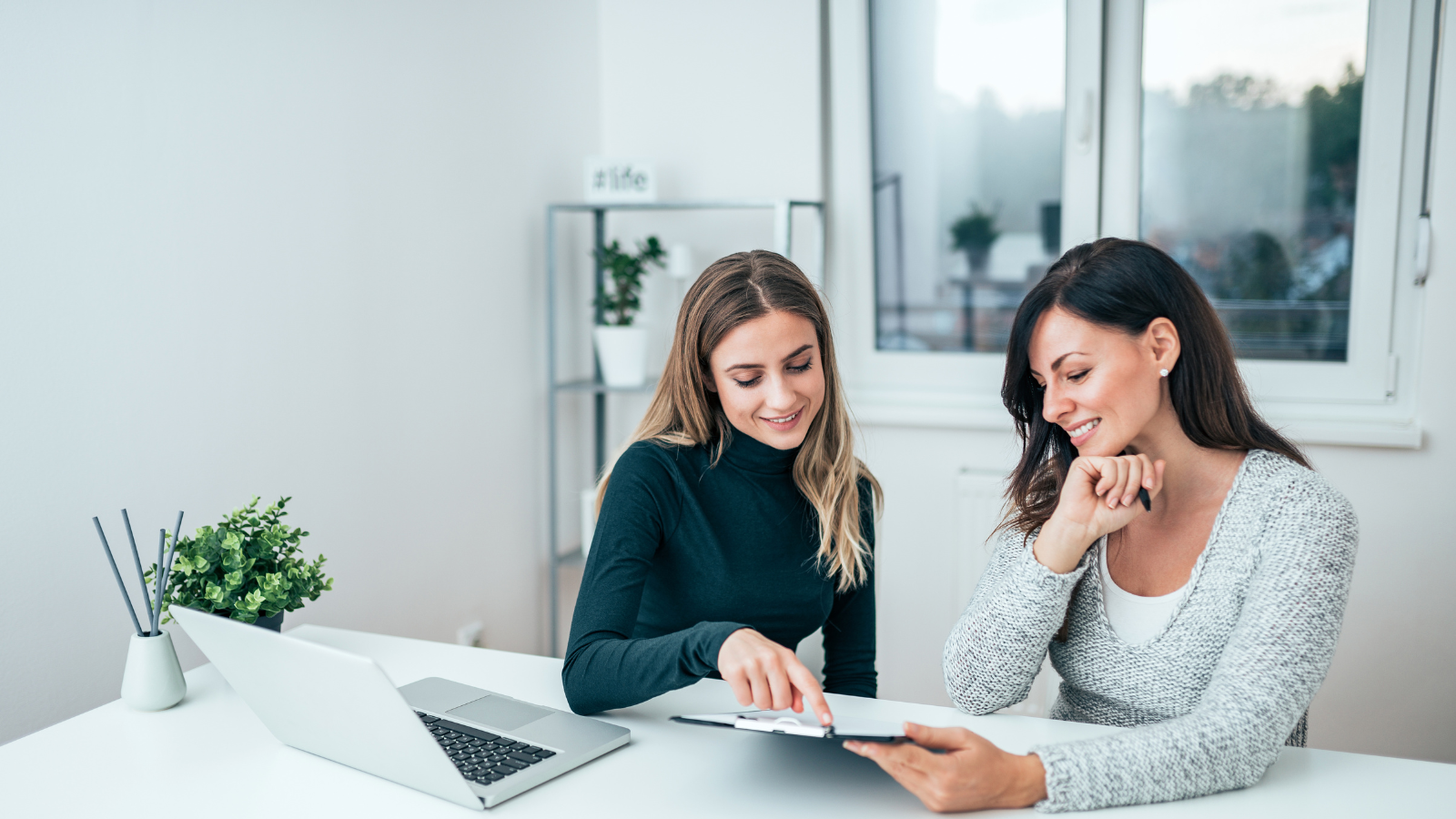 Two Women Working