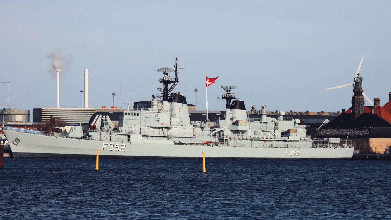 White navy boat on on the water