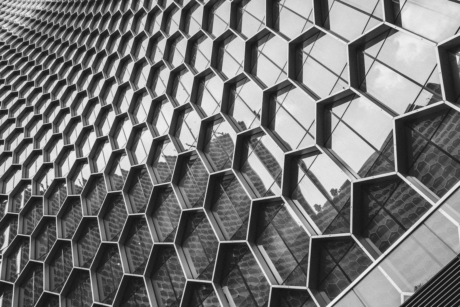 Low angle photo of an architectural building in black and white