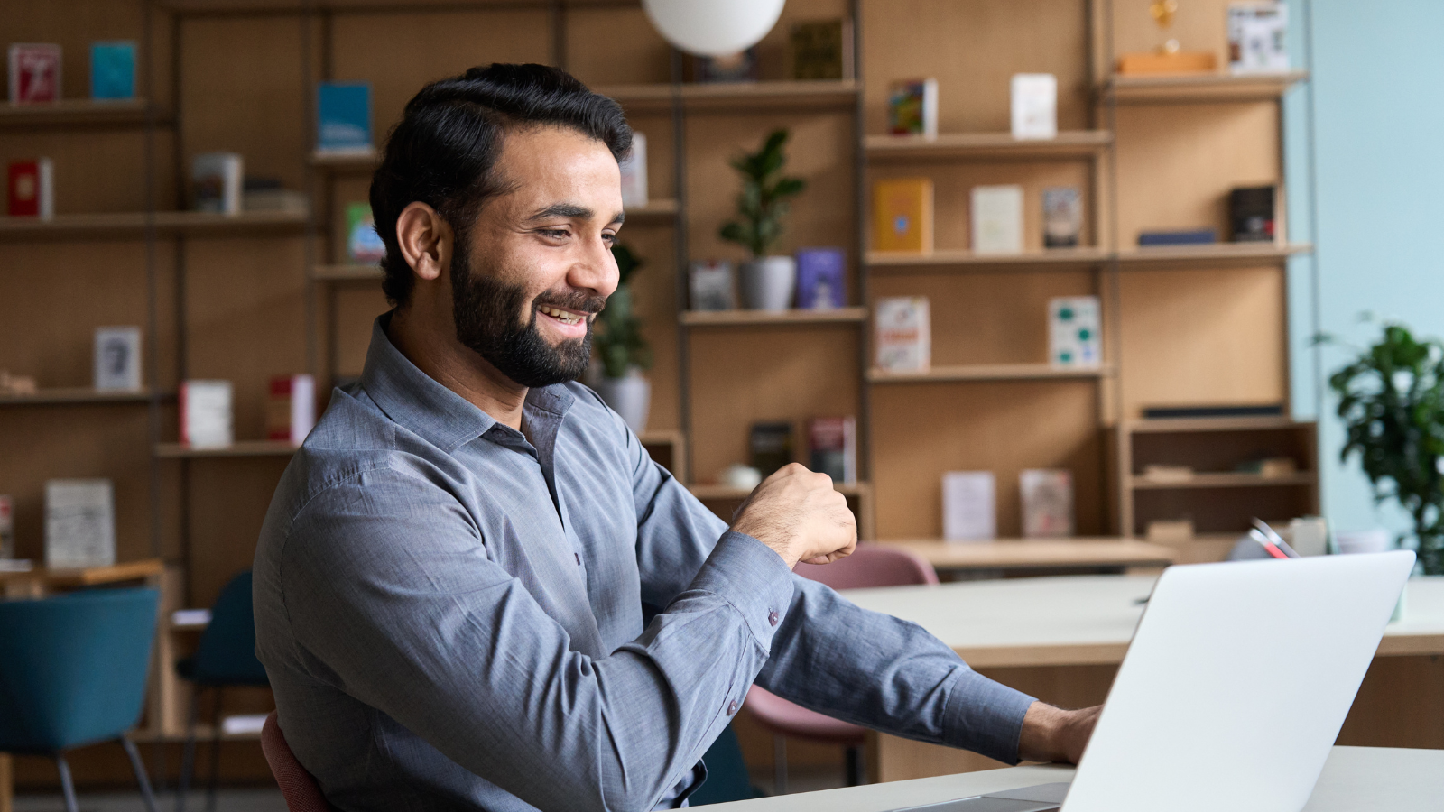 Man sitting in front of laptop