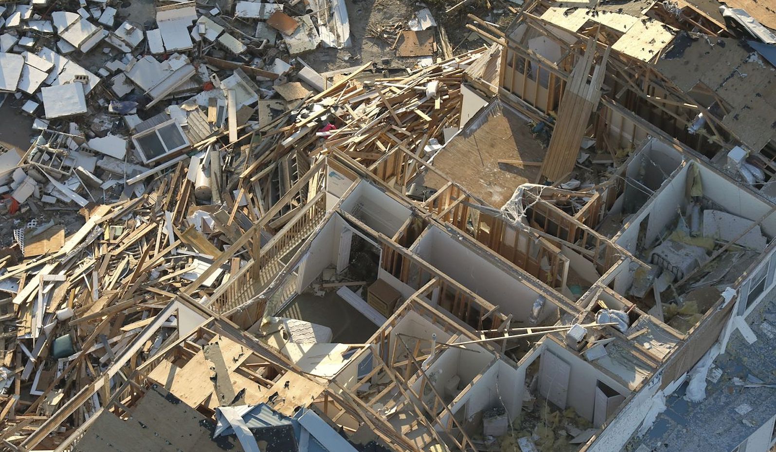 Overhead photo of a damaged and torn apart home