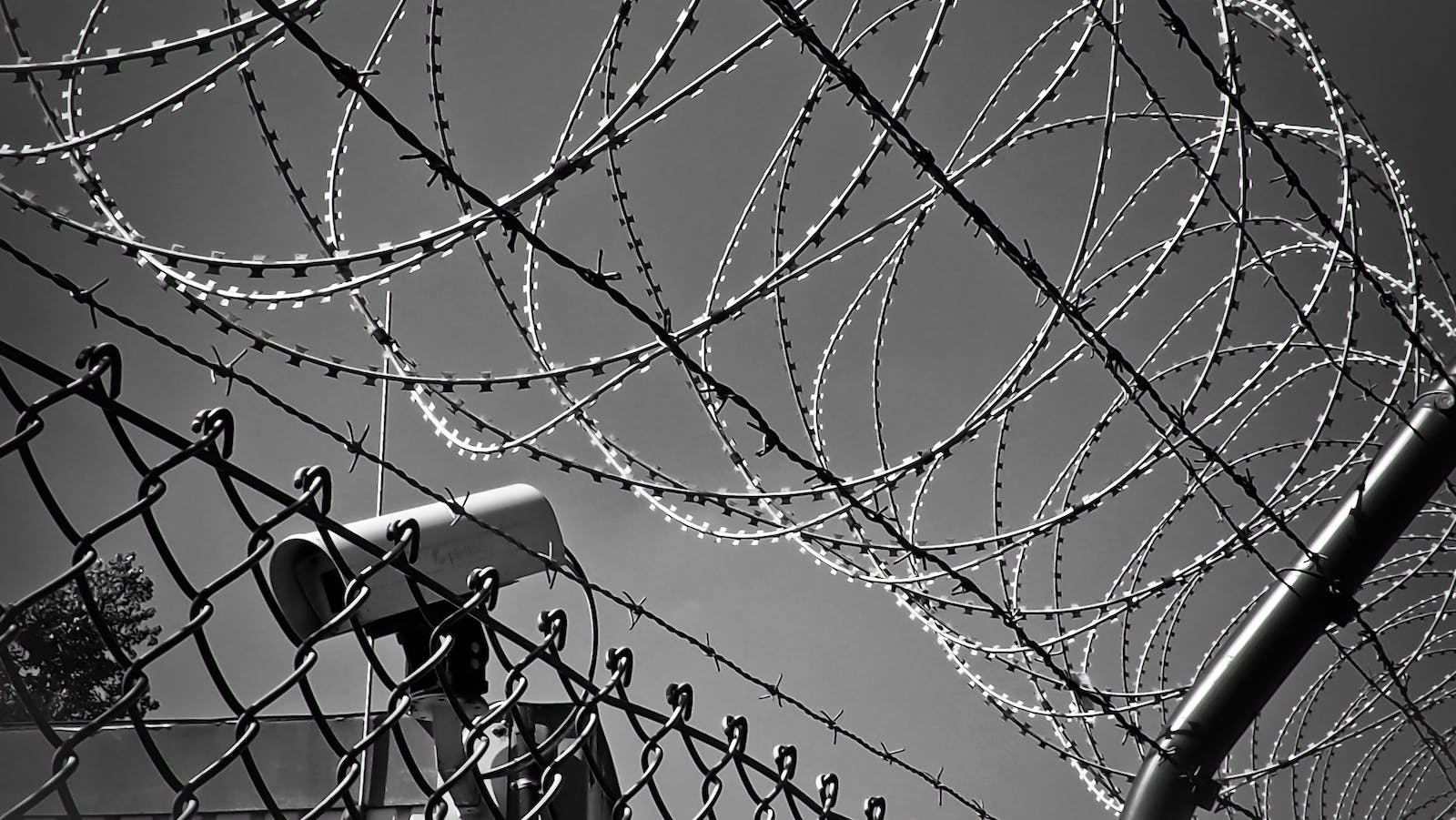 Barbed wire and security camera