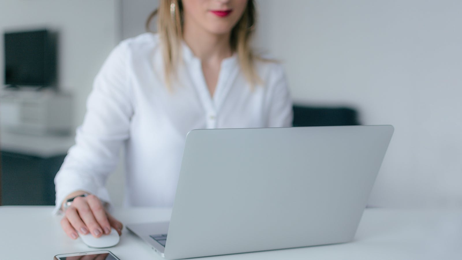 Woman Using Silver Laptop