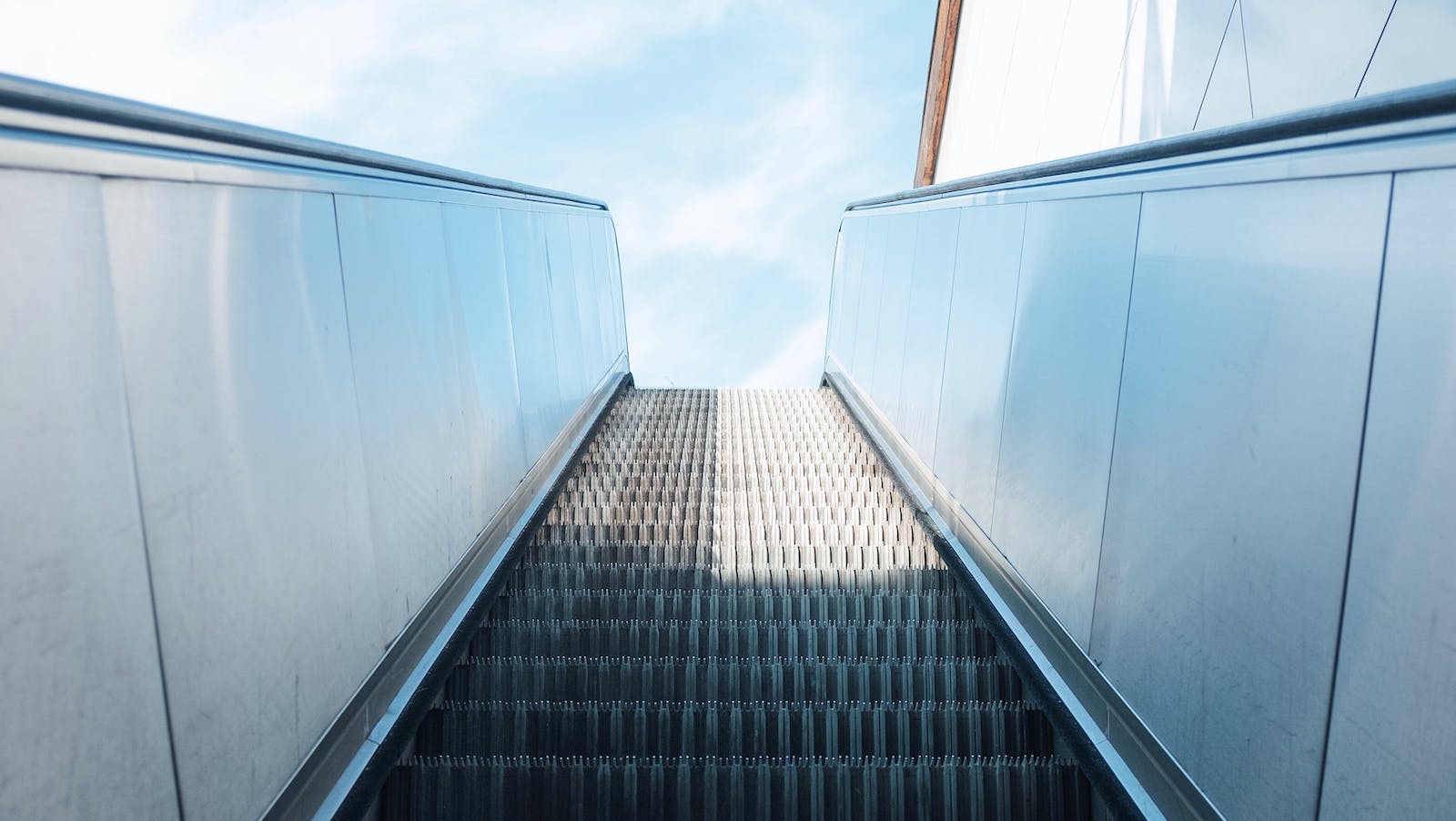 Escalator with open sky behind it