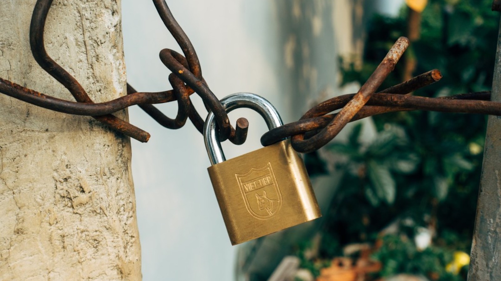 Lock on rusting chain