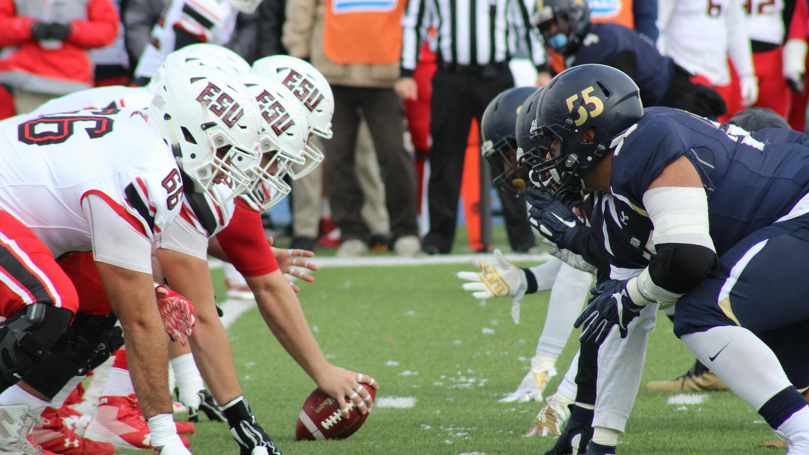 Action shot of two football teams