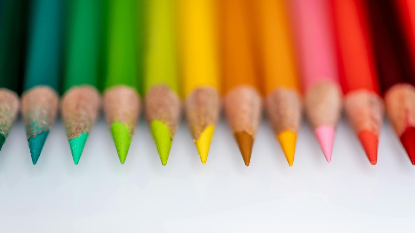 Set of colored pencils on table