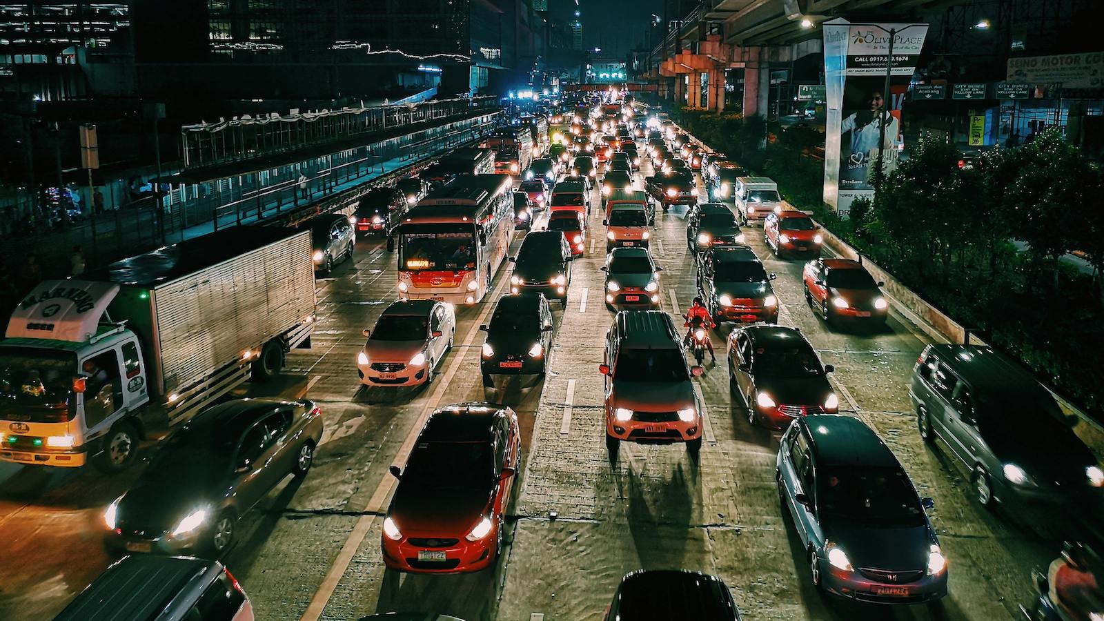 Photo of Vehicles On Road During Evening