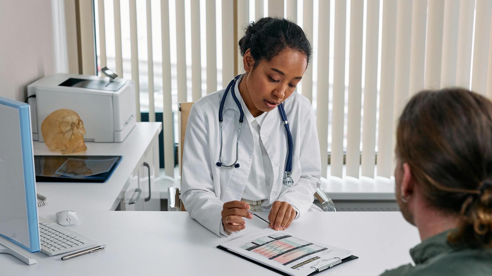 A Doctor Talking the Patient