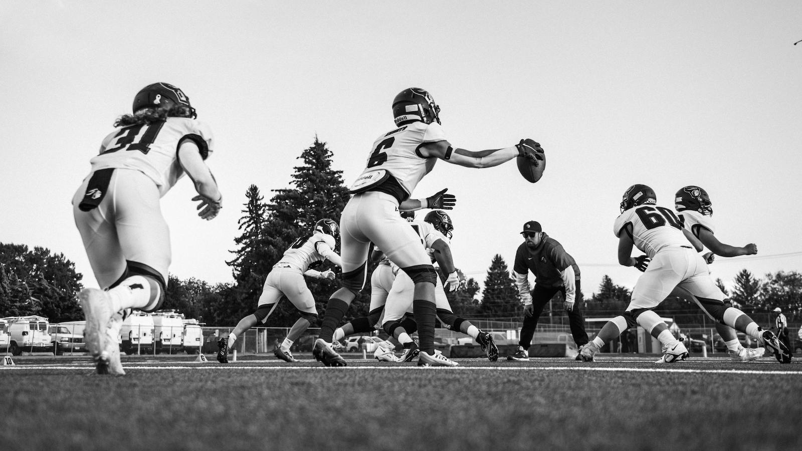Dynamic Black and White Football Practice Scene