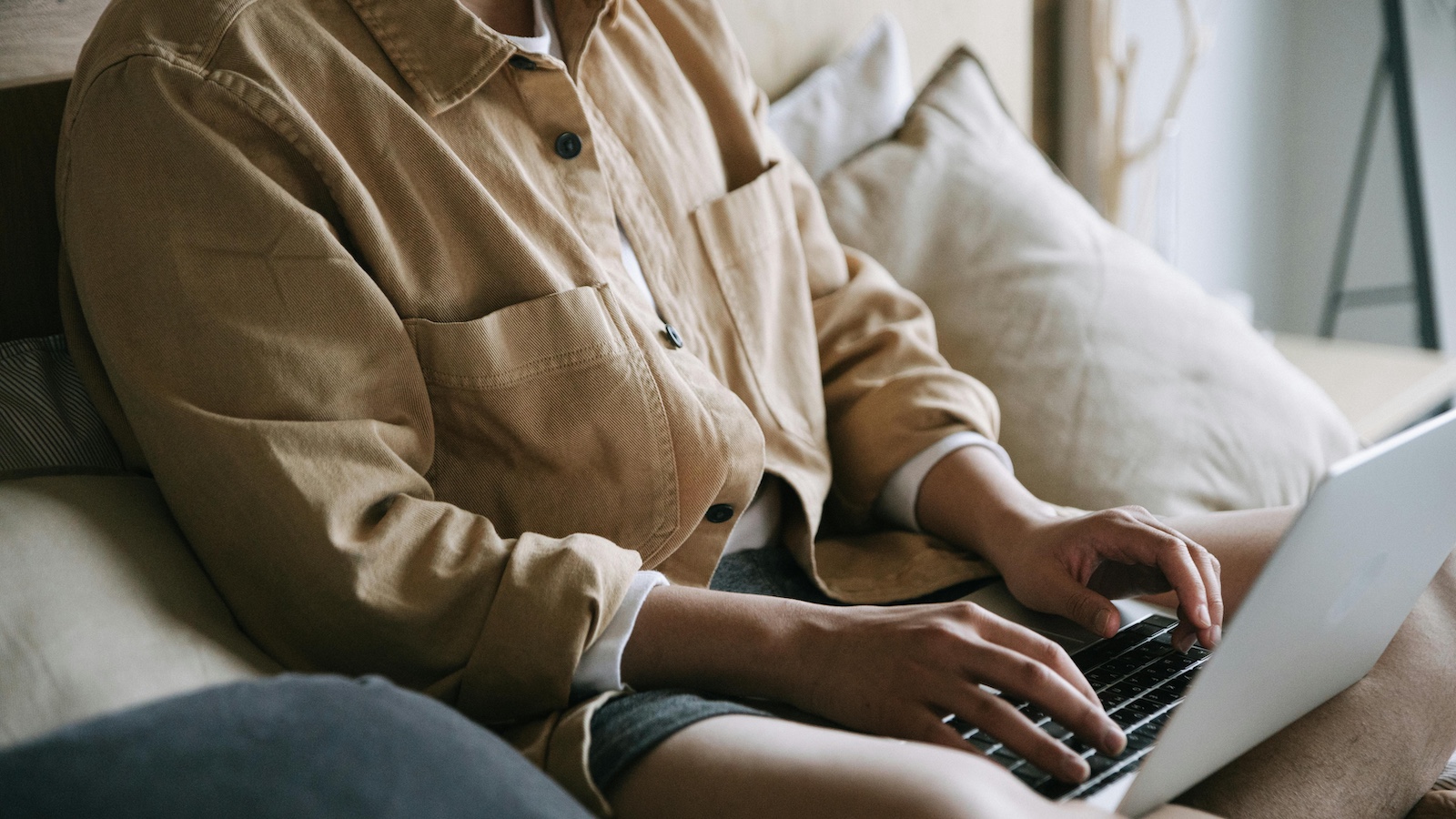 A Close-Up Shot of a Person Using a Laptop