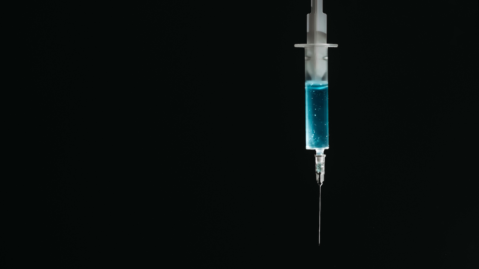Syringe on Black Background