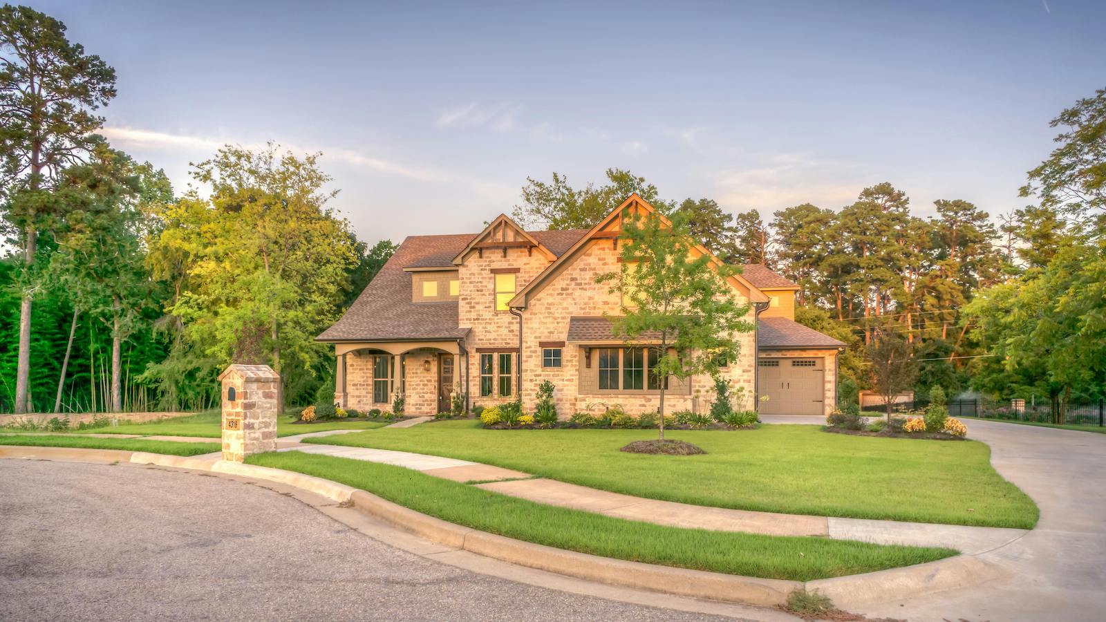 Brown Brick House Beside Trees