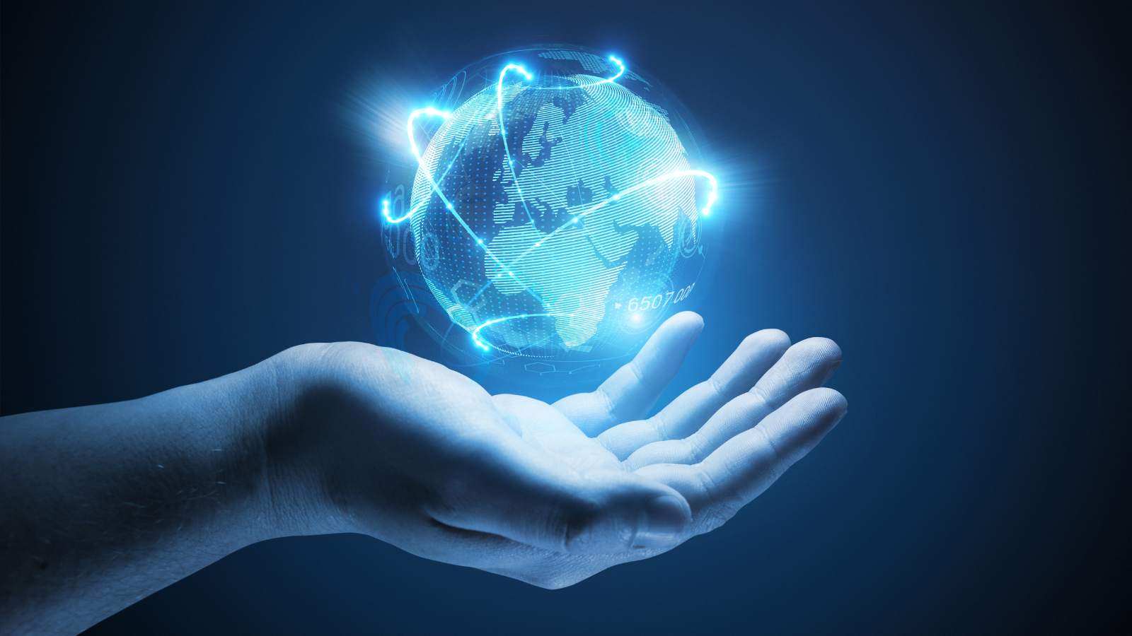 hand holding glowing earth