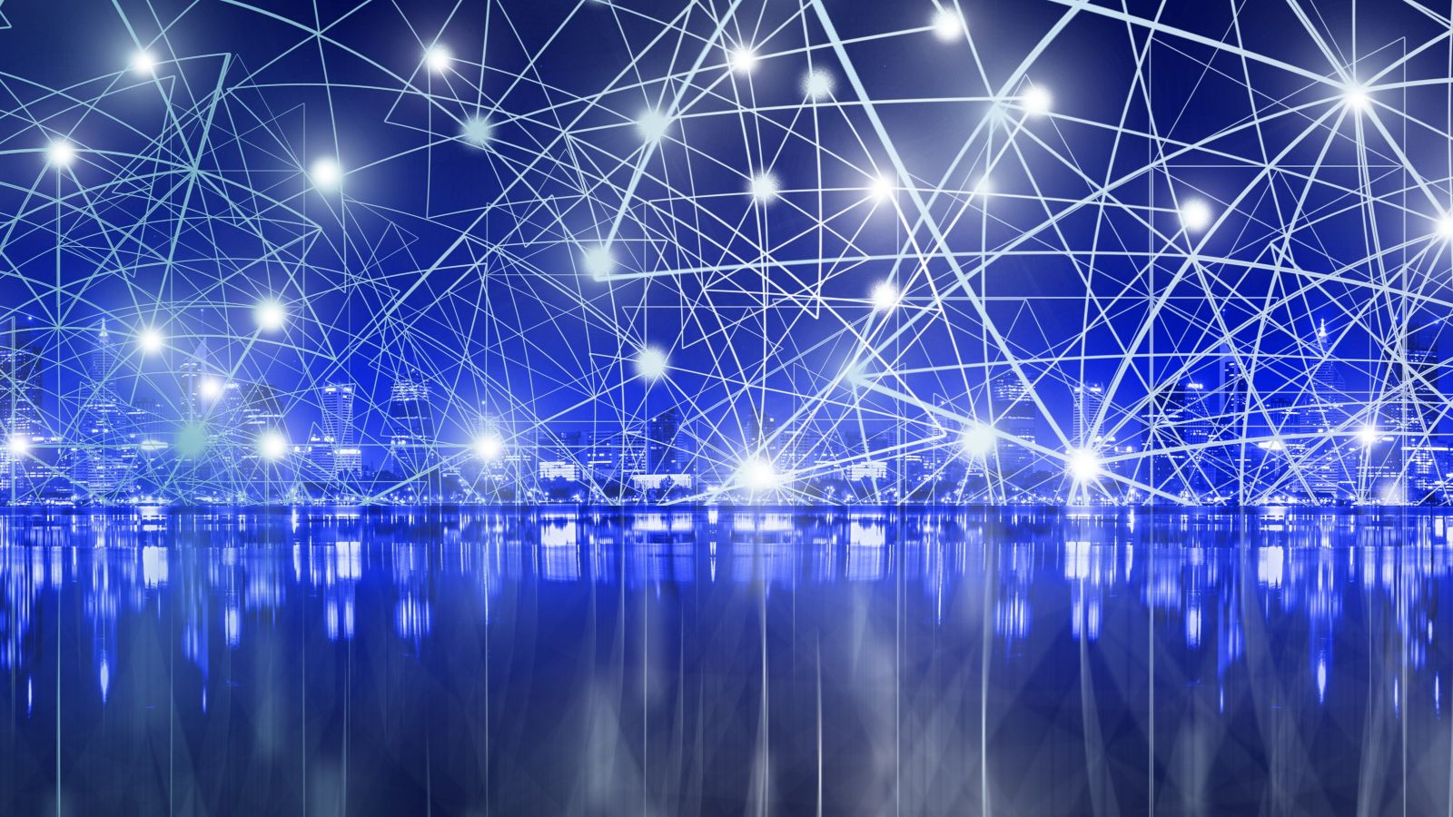 Network across a dark blue background and sky showing a city skyline