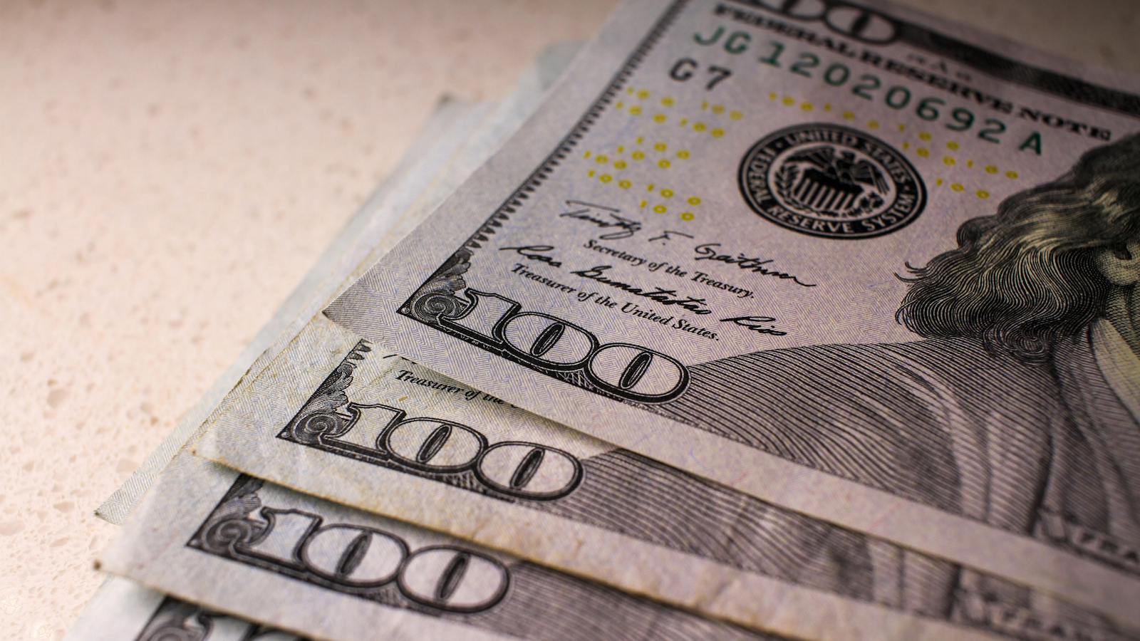 Close-Up Shot of Hundred Dollar Bills 