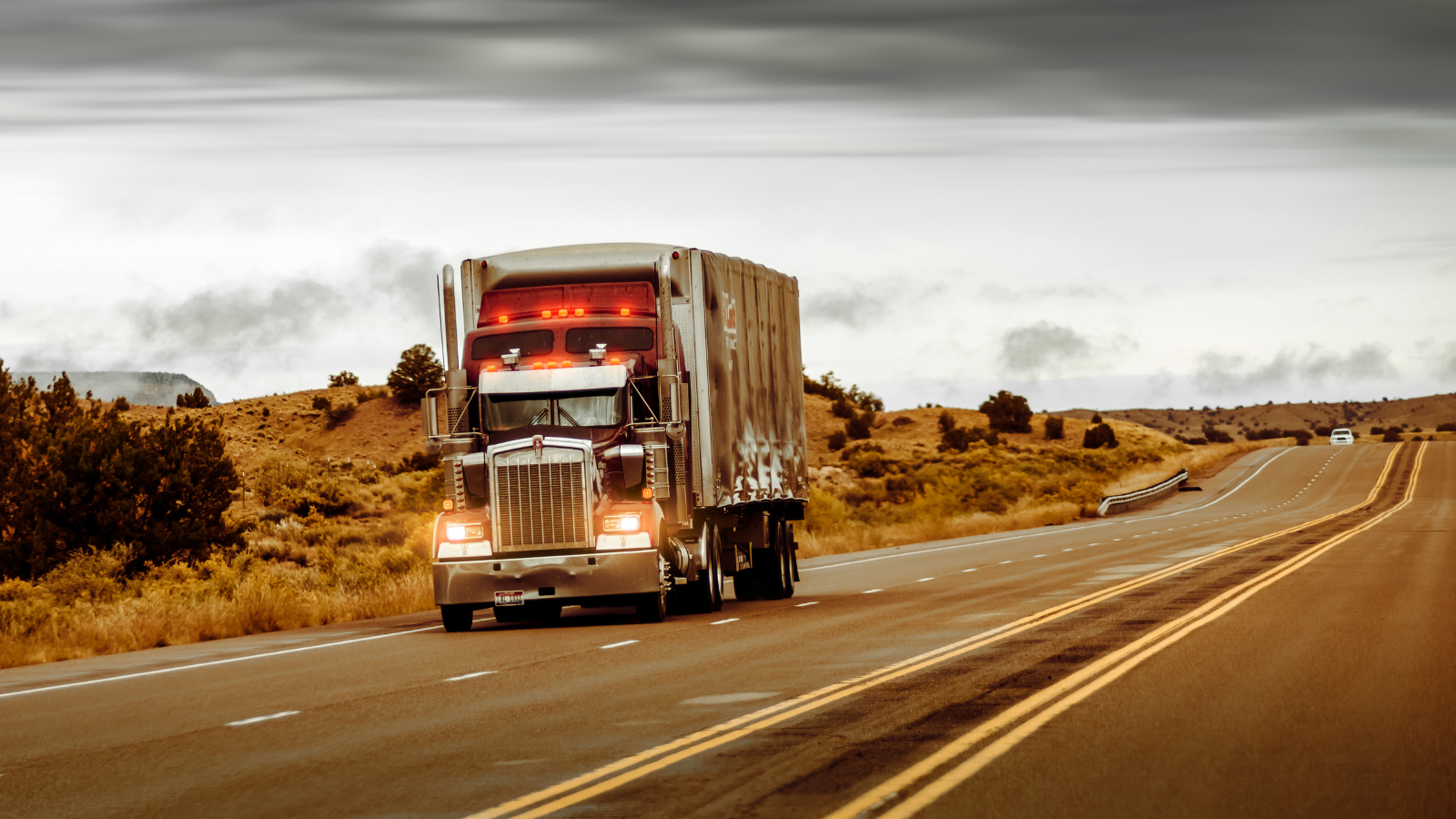Tractor Trailer Driving on a Road