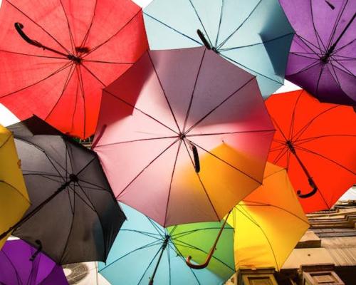 Colorful umbrellas from a below angle