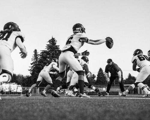 Dynamic Black and White Football Practice Scene