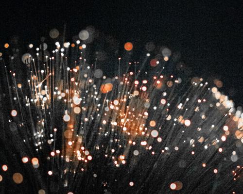 Macro Photography of Orange Fiber Optic
