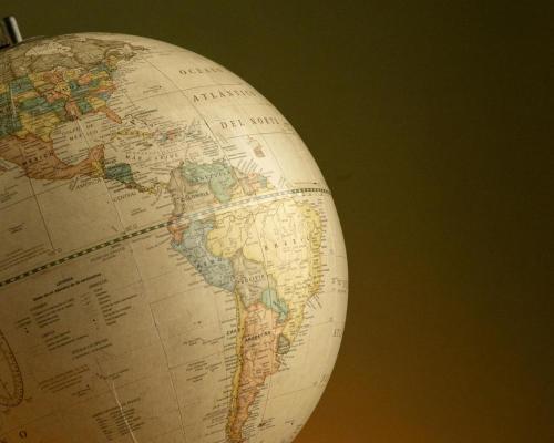 Vintage Globe with Map of Americas in Warm Lighting