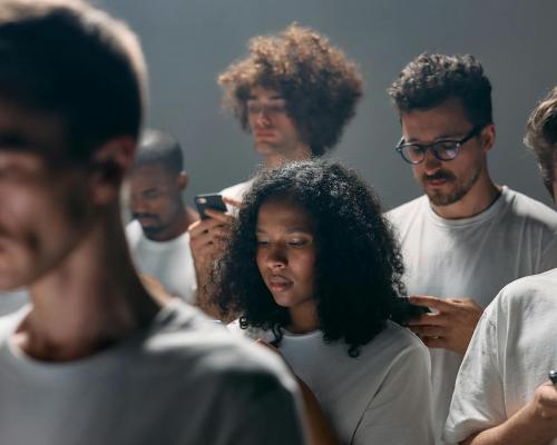 Photo of People Using Smartphones