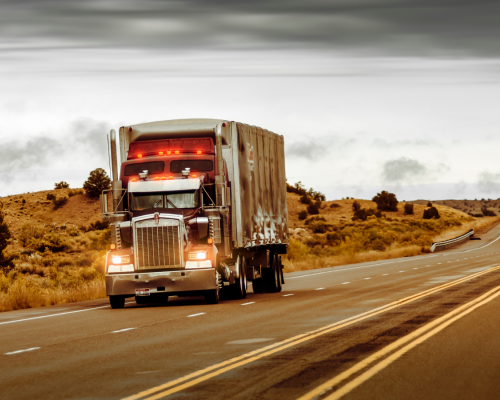 Tractor Trailer Driving on a Road