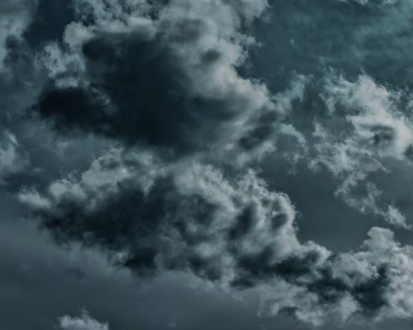 Dark storm clouds in a dark sky