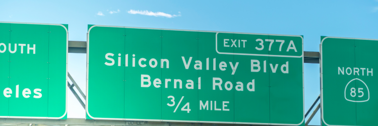 a road sign that reads Silicon Valley Blvd exit 377A 3/4 mile