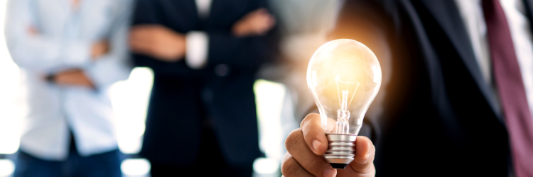 Man holding light bulb