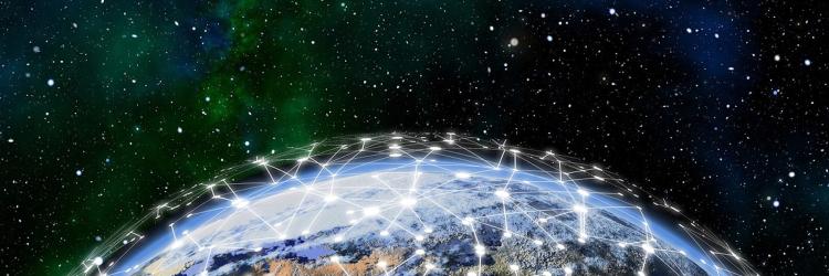 An image showing Earth from outer space with connected lines across the top showing blockchain