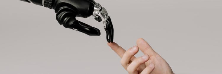 Bionic Hand and Human Hand Finger Pointing at each other